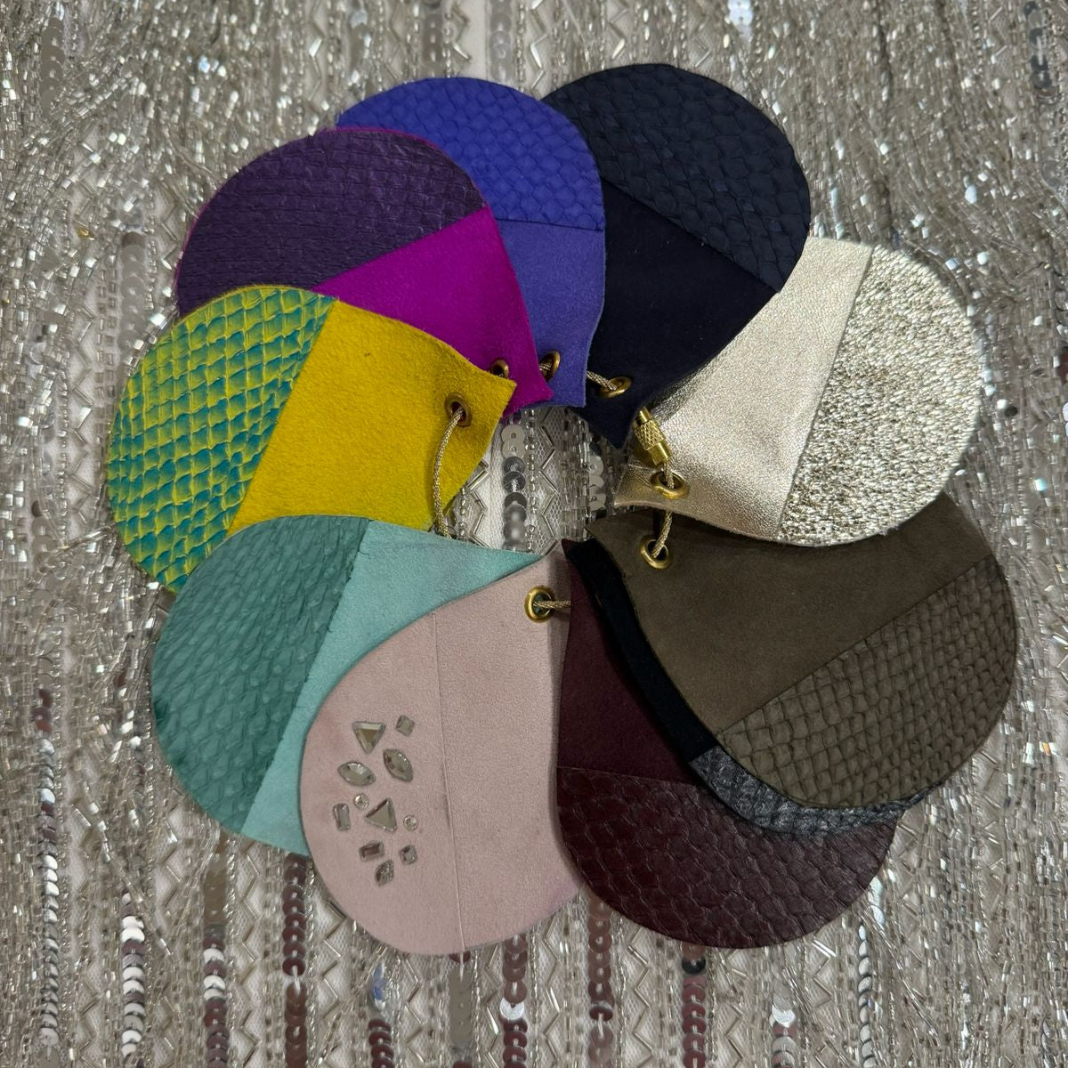 Luxury footwear colour swatch book from Elandetta featuring premium suede and leather samples, allowing customers to match shoe colours to their wardrobe before buying online.