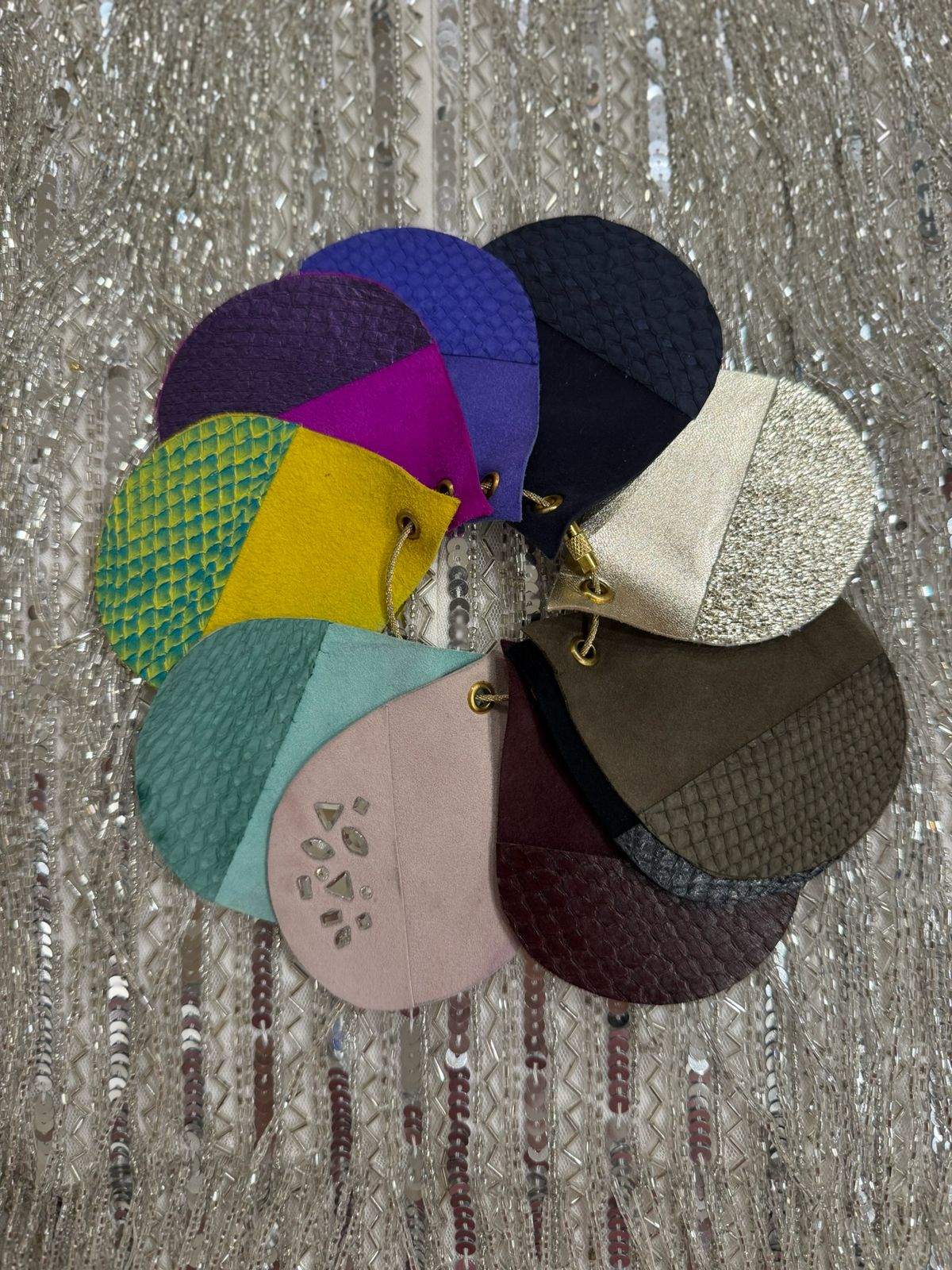 Luxury footwear colour swatch book from Elandetta featuring premium suede and leather samples, allowing customers to match shoe colours to their wardrobe before buying online.
