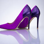 Rear view of Elandetta Amethyst heels highlighting dark violet textured leather detailing and sculpted heel silhouette.