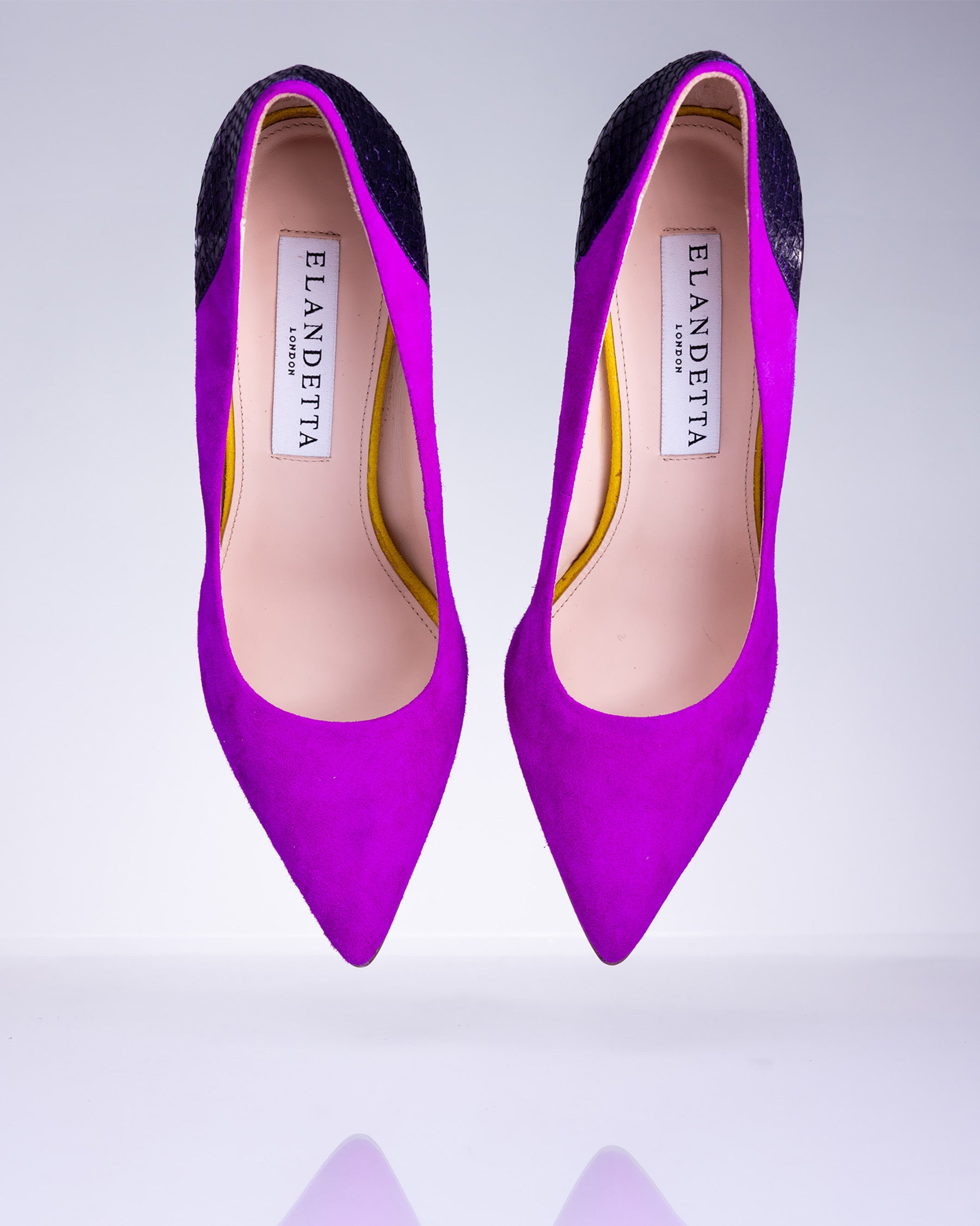 Pair of Elandetta Amethyst purple pink suede pointed heels with deep violet textured leather detailing.