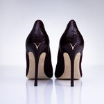 Rear view of Elandetta Bordeaux heels highlighting textured burgundy leather detailing and signature heel silhouette.
