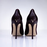 Rear view of Elandetta Bordeaux heels highlighting textured burgundy leather detailing and signature heel silhouette.