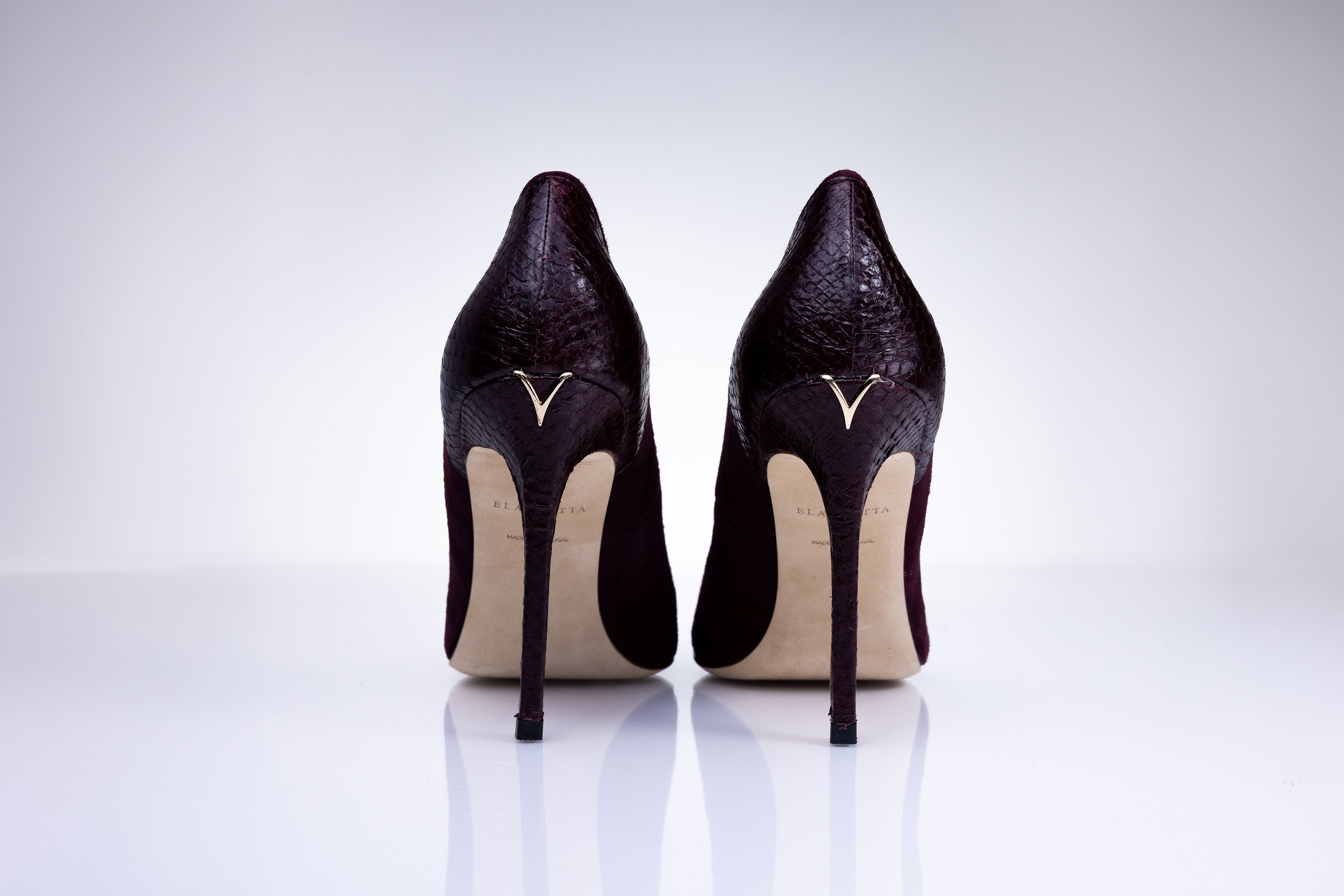 Rear view of Elandetta Bordeaux heels highlighting textured burgundy leather detailing and signature heel silhouette.
