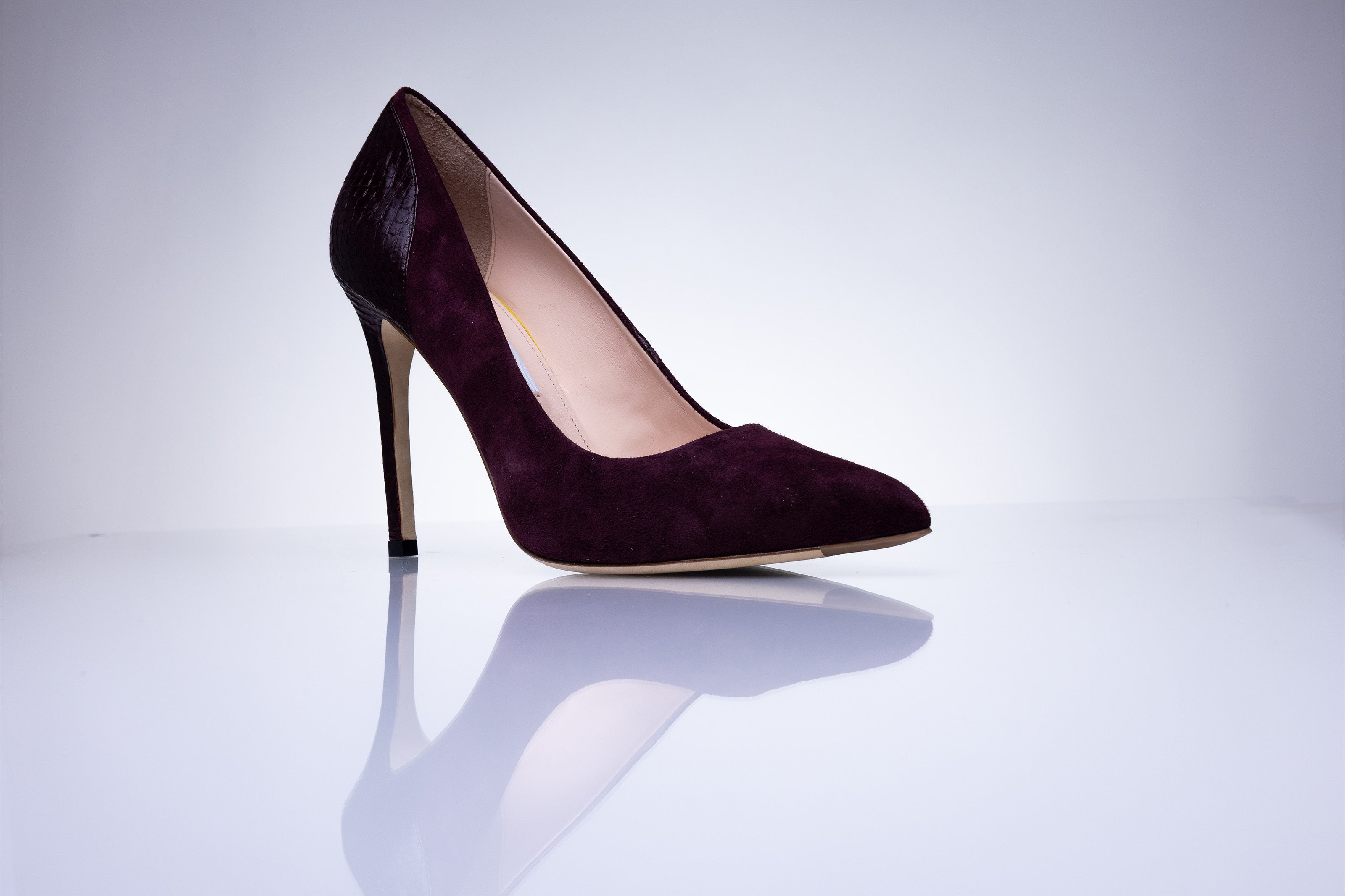 Side profile of the Elandetta Bordeaux luxury suede heel with slim stiletto silhouette and rich burgundy tones.