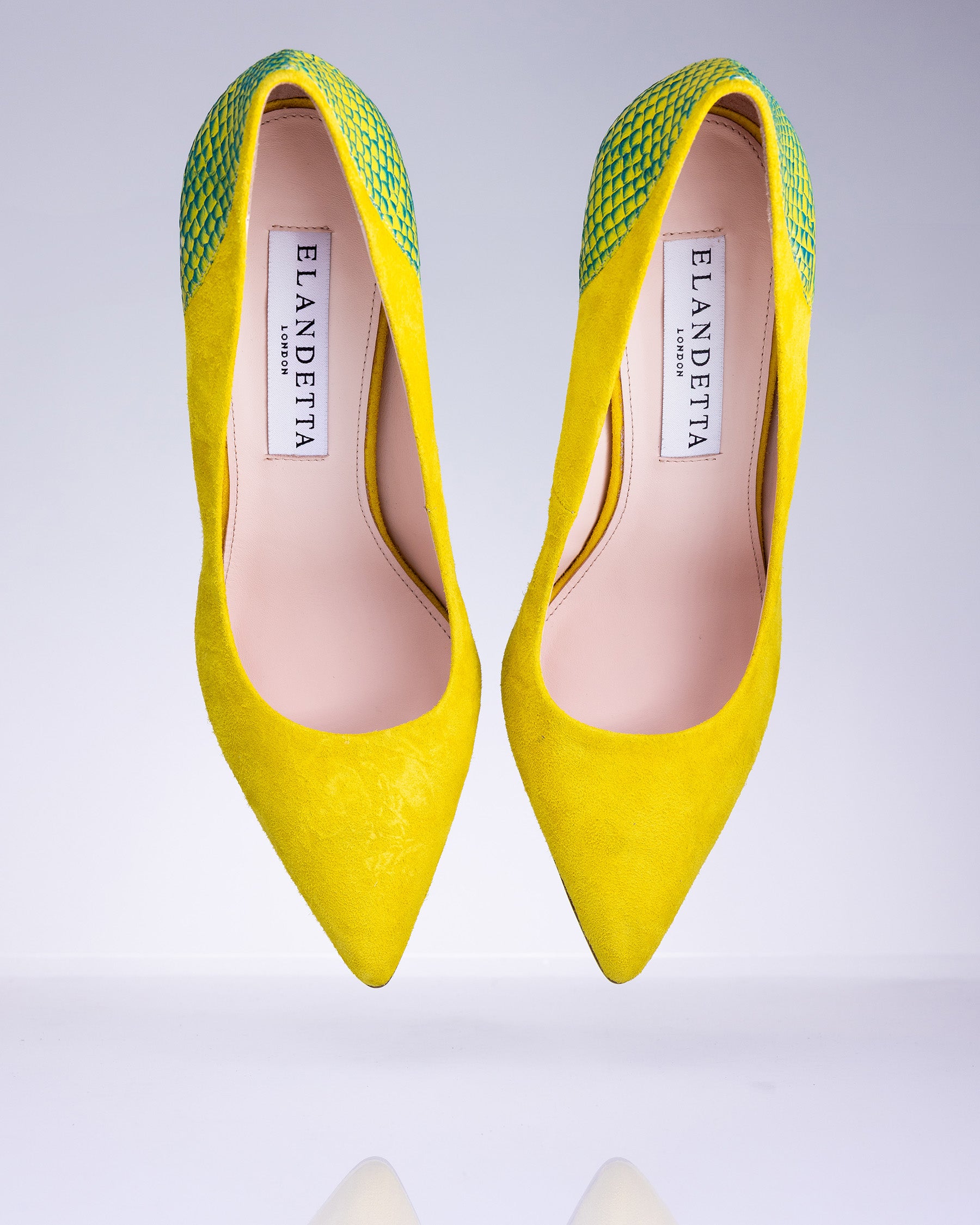 Elandetta Boujee bright yellow suede pointed heel with green textured leather detailing and slim stiletto silhouette.