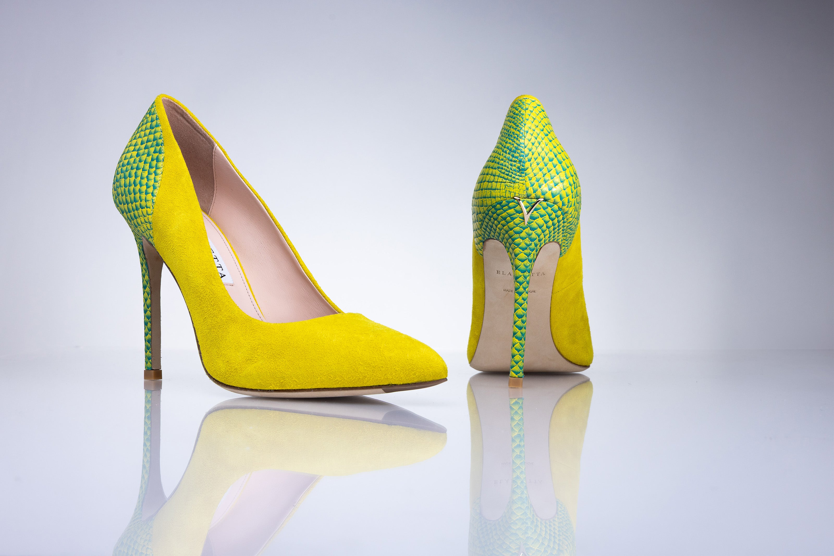 Side profile of the Elandetta Bouee bright yellow suede stiletto heel with contrasting green textured finish.