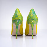 Rear angle of Elandetta Bouee heels highlighting green textured leather detailing and slim heel silhouette.