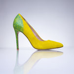 Pair of Elandetta Bouee yellow suede heels featuring pointed toes and green textured leather heel detail.