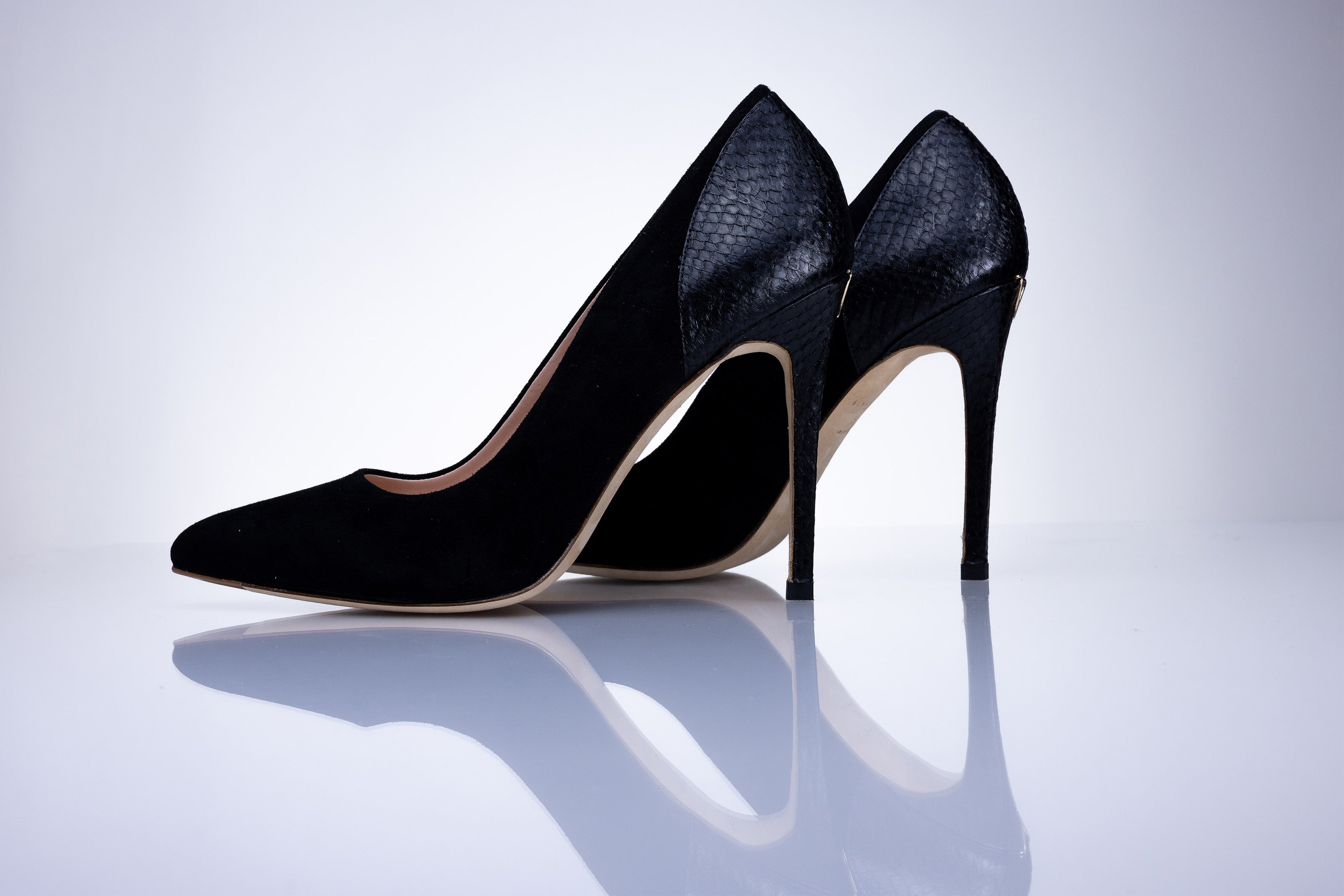 Elandetta Ink pointed suede heels in an intense deep black tone with sculpted stiletto heels.