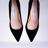 Pair of Elandetta Ink deep black suede pointed heels with textured black leather detailing and elegant silhouette.