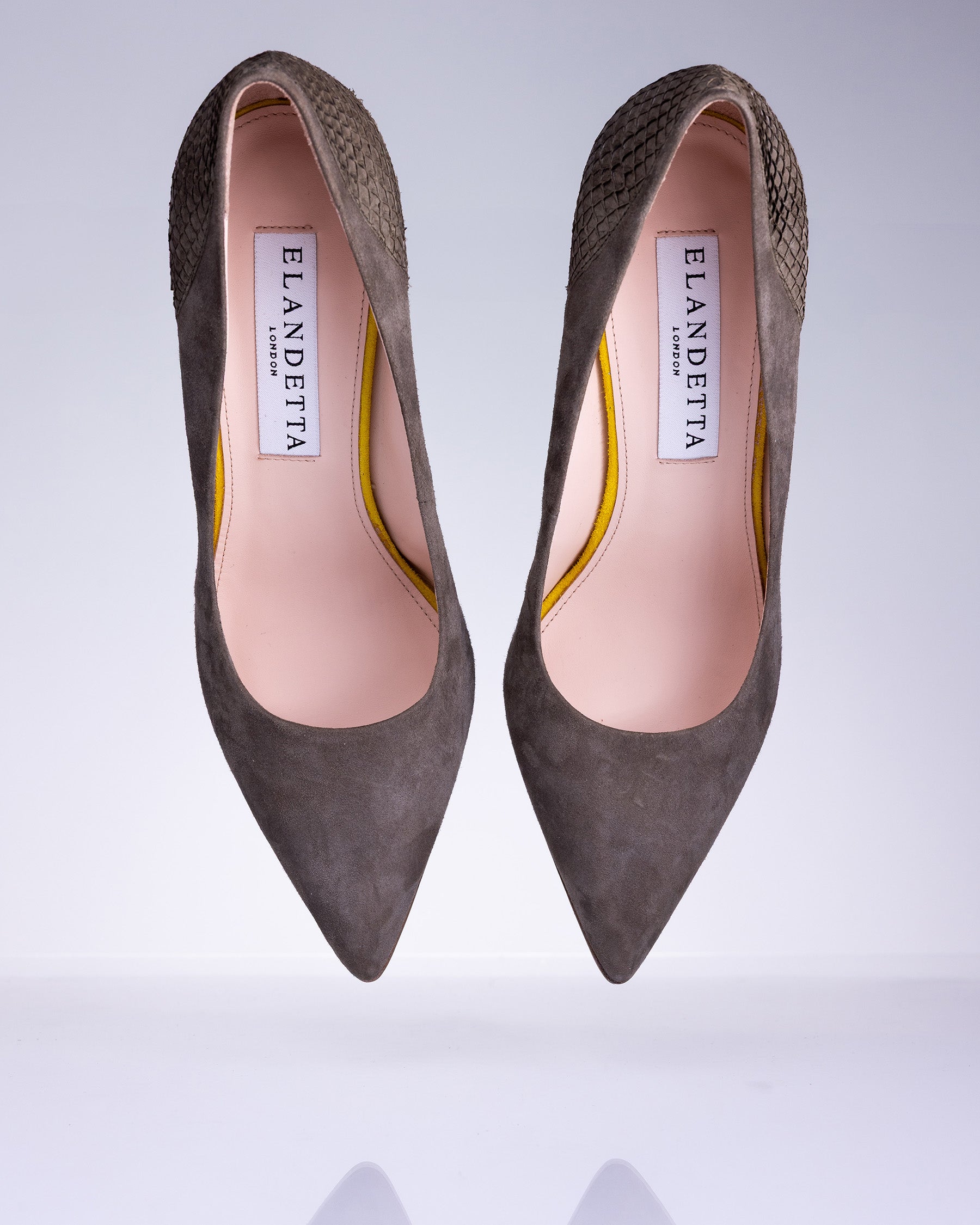 Pair of Elandetta Moka taupe mushroom suede pointed heels with textured leather detailing and elegant silhouette.