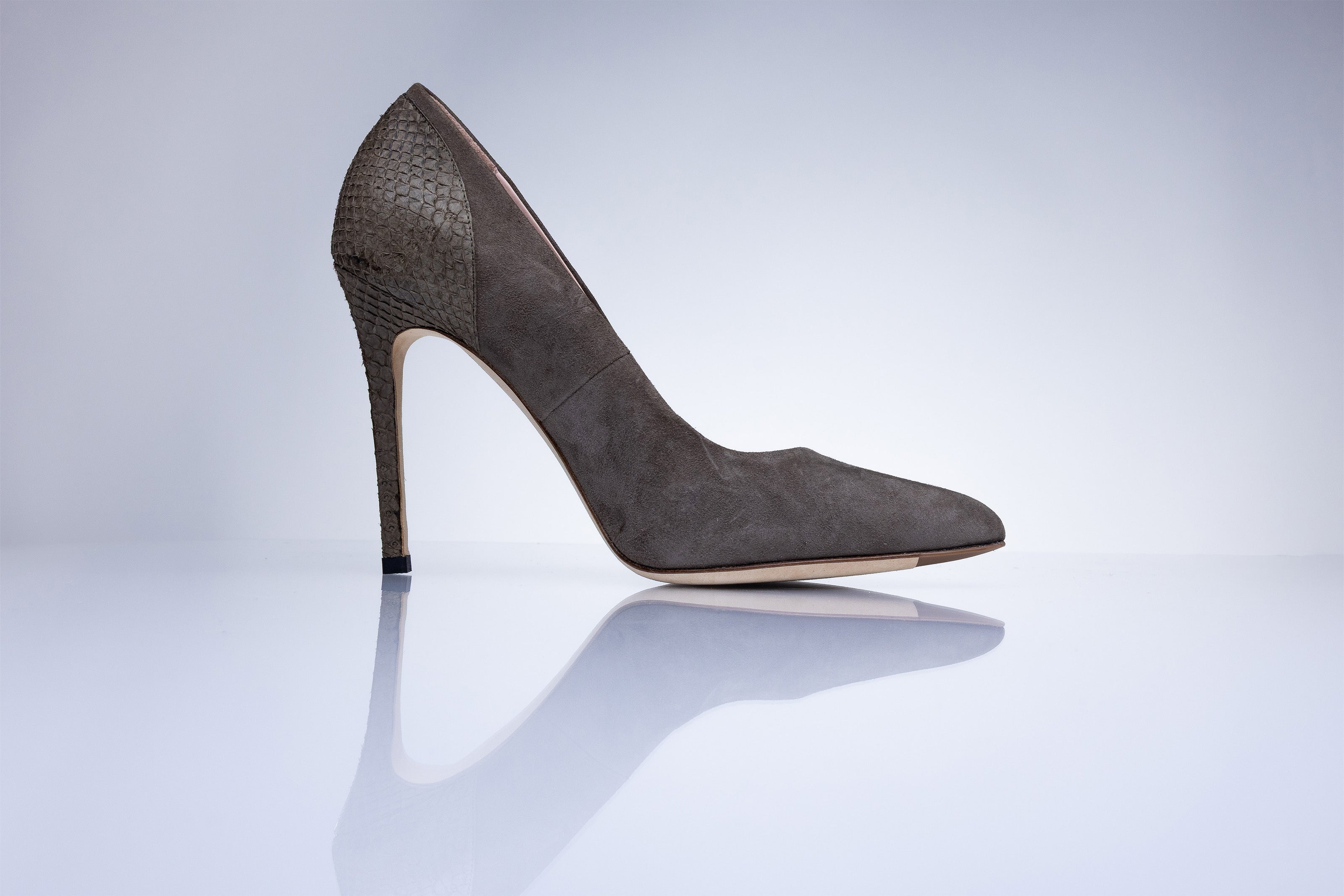 Side profile of the Elandetta Moka luxury suede heel with slim stiletto silhouette and soft taupe mushroom tones.