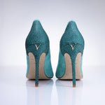 Rear view of Elandetta Sage Green heels highlighting aqua green textured leather detailing and signature heel silhouette.