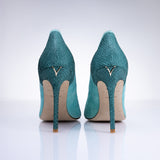 Rear view of Elandetta Sage Green heels highlighting aqua green textured leather detailing and signature heel silhouette.