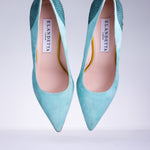 Pair of Elandetta Sage Green suede pointed heels with soft aqua blue undertones and textured leather detailing.