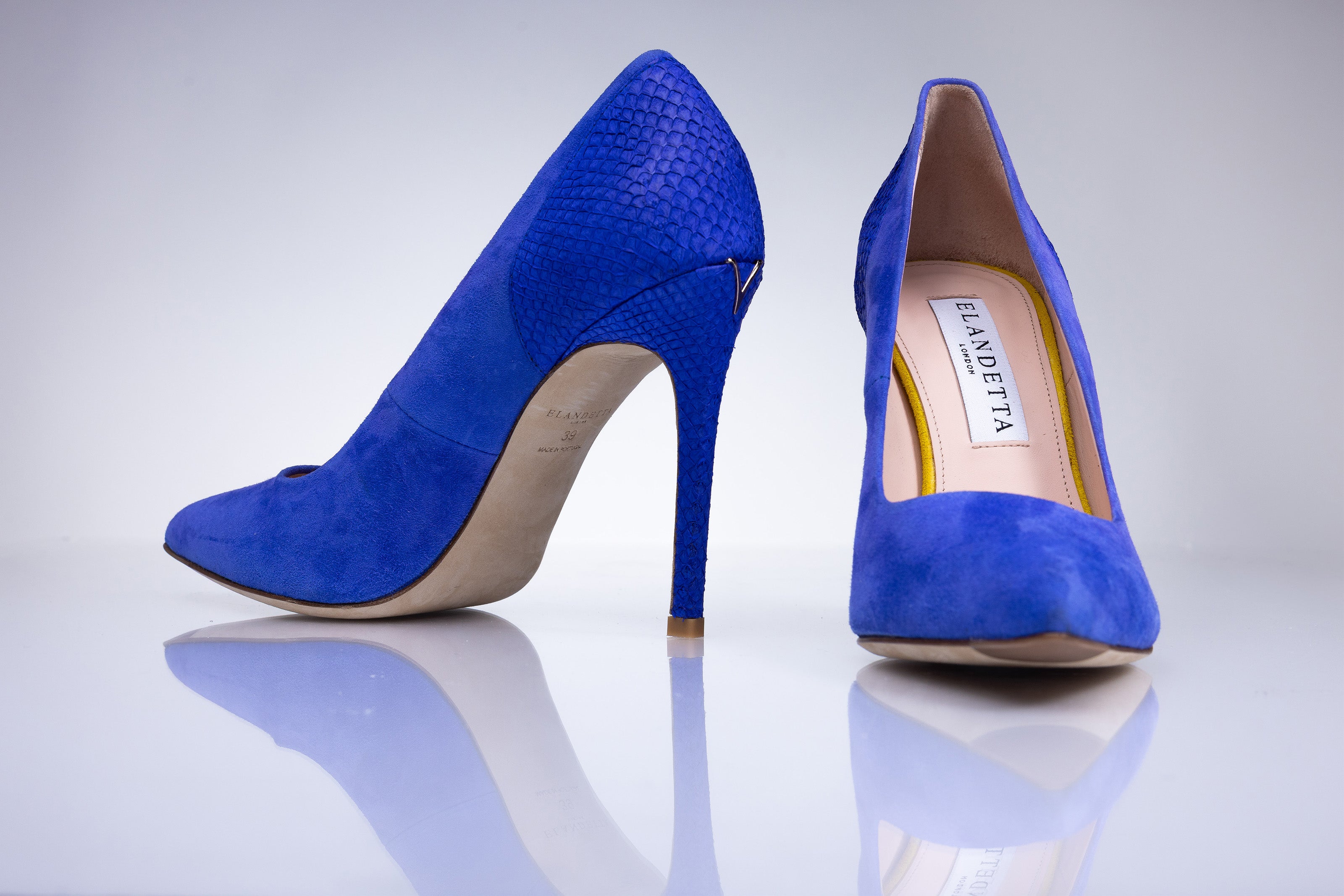 Electric blue suede pointed heels by Elandetta designed for bold modern occasion dressing.