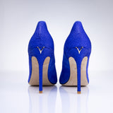 Rear view of Elandetta Ultraviolet electric blue suede heels featuring sleek stiletto heels and signature detailing.