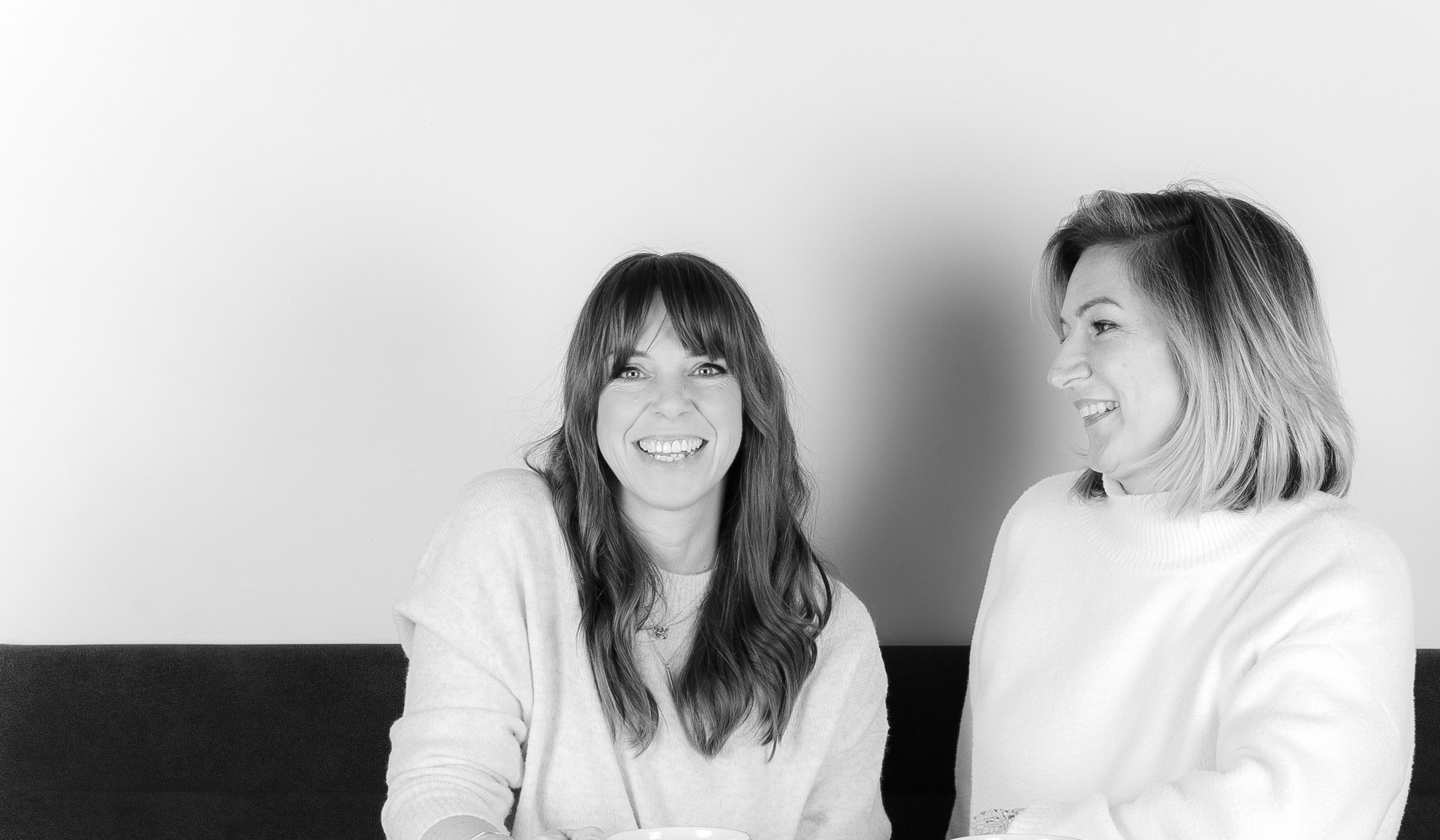 Black and white portrait of Elandetta founders Elizabeth Michaelas and Hetty Rose, creators of the British luxury footwear brand focused on colour confidence, craftsmanship and beautifully made suede pointed heels.