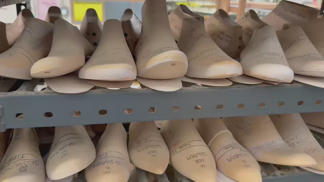 Video of traditional shoemaking lasts stored in a workshop during the development of Elandetta luxury pointed heels. The footage highlights the craftsmanship, precision fitting and artisanal process behind Elandetta’s colour-led footwear, inspired by British shoemaking heritage and designed for lasting quality.